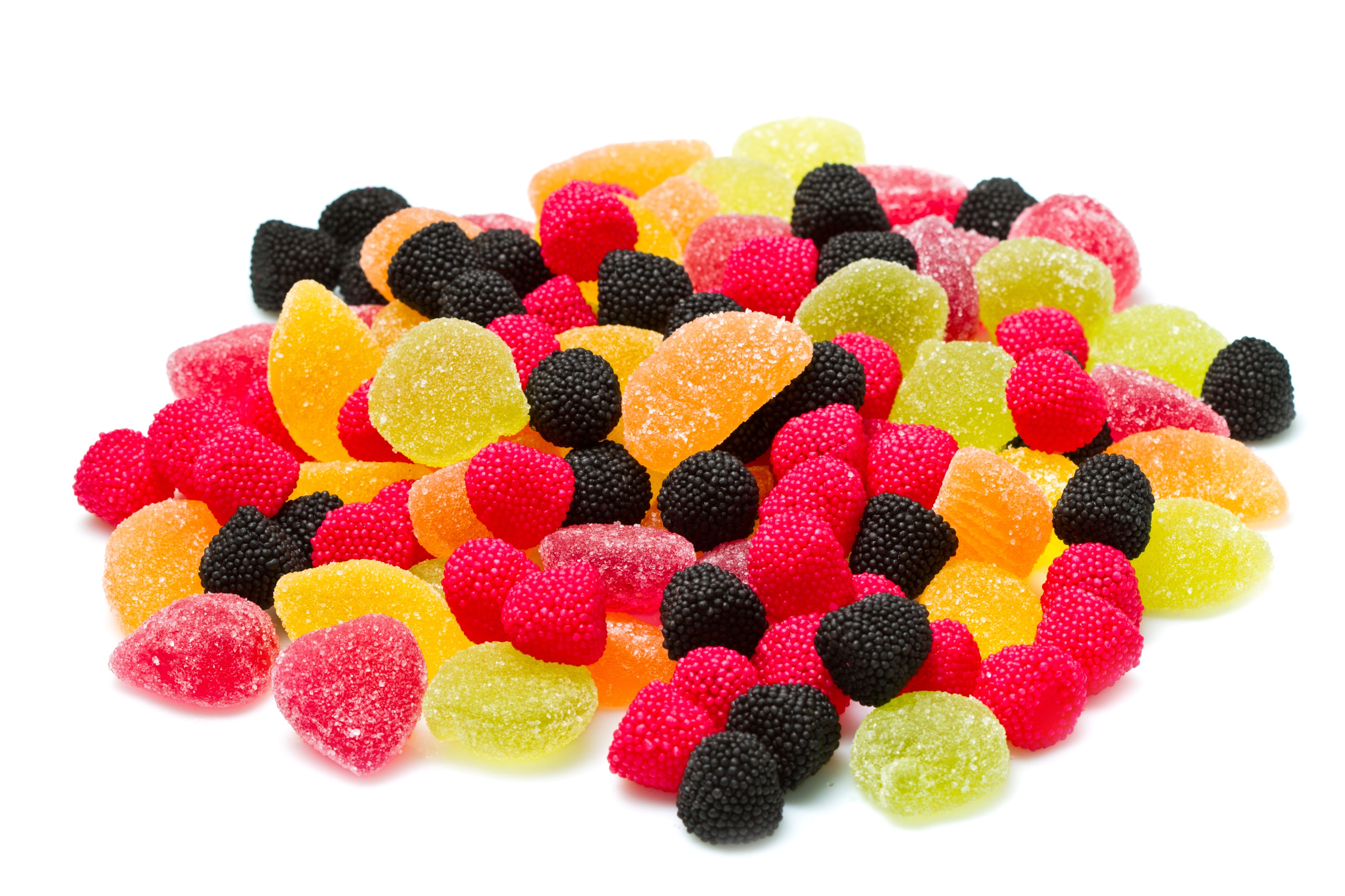 Delicious nutraceutical gummy supplement manufacturing at Biowell Labs—a vibrant assortment of sugar-coated and berry-textured gummies, highlighting private label gummy production in a Health Canada approved facility.